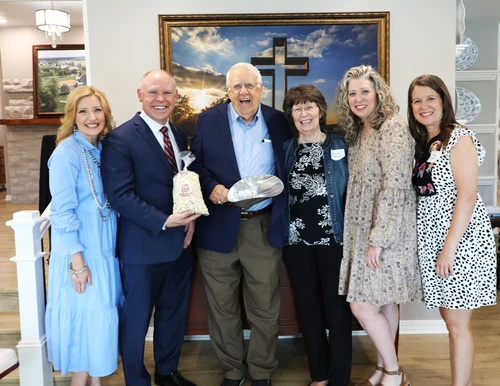 Dr. Johnson and Mrs. Johnson with the Newbury famiy